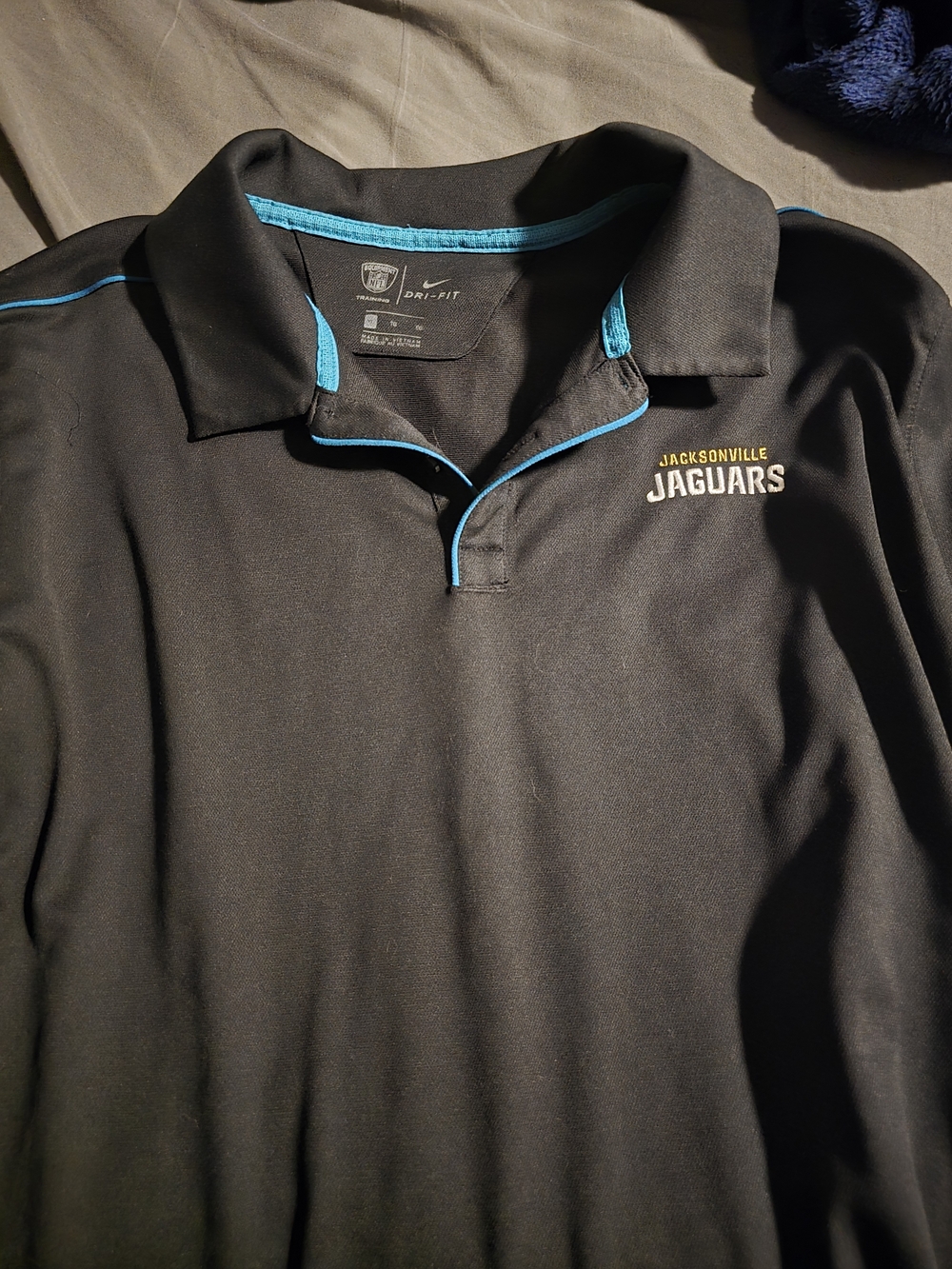Nike Jacksonville Jaguars Black Polo with Teal Trim